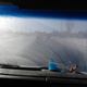 This picture was taken during one of the few times I suckered a co-worker into driving in my stead. Note the window cleaner placed strategically over the defroster vent to thaw...